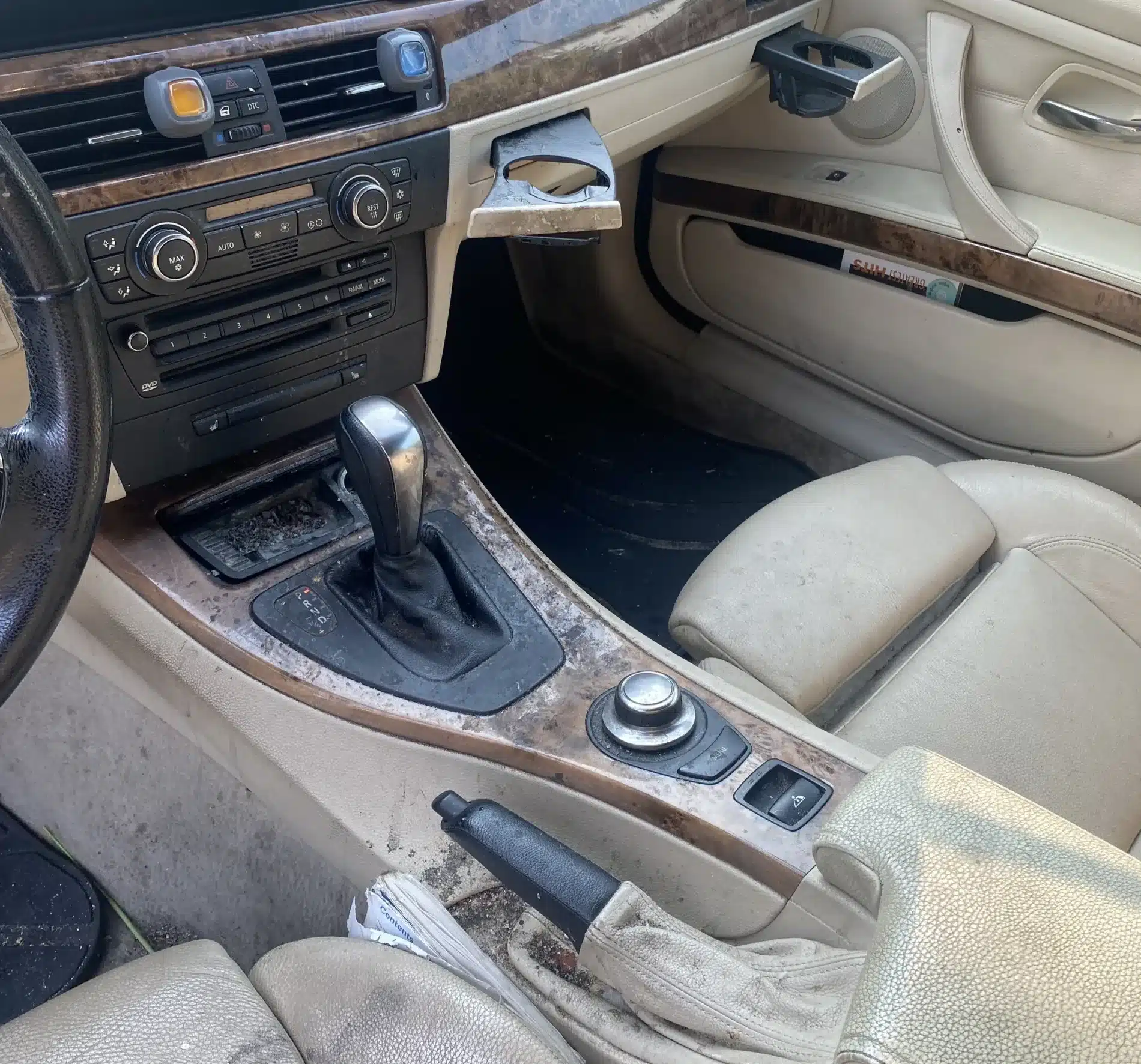 steam cleaning the leather seats and panels in a car removing the built up cigarette residue