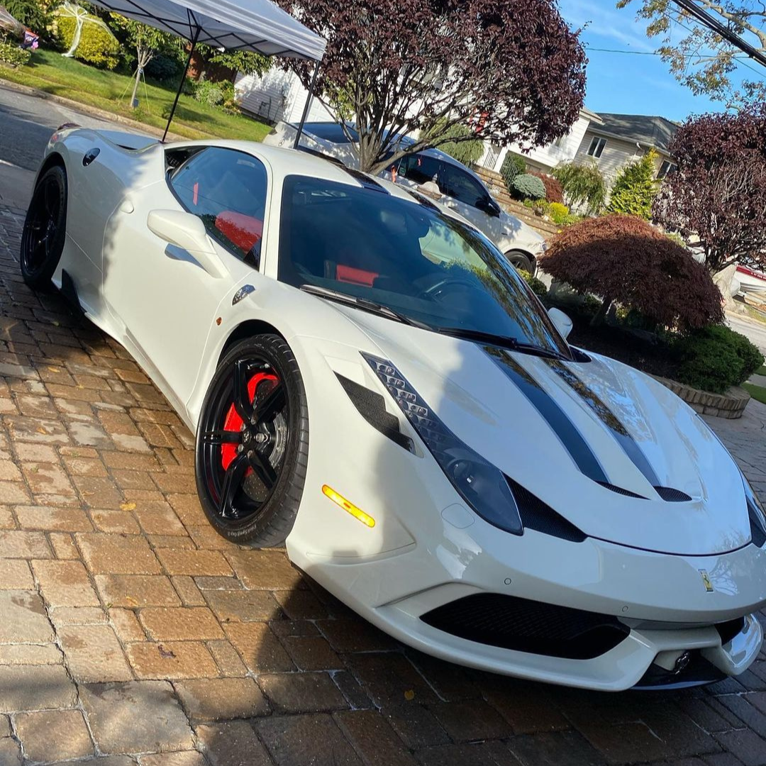 A white Ferrari that was detailed by FinalForm Auto Spa